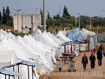 Лагерь беженцев на границе Сирии и Турции. Фото Reuters