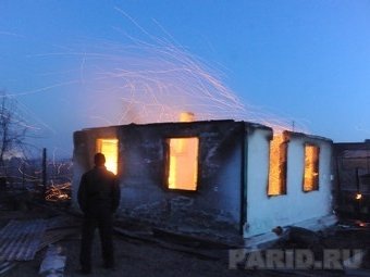 Выгоревший дом в Забайкалье. Архивное фото РИА Новости, Денис Гуков